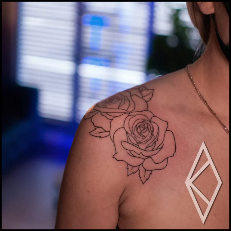 Fineline rose outline tattoo